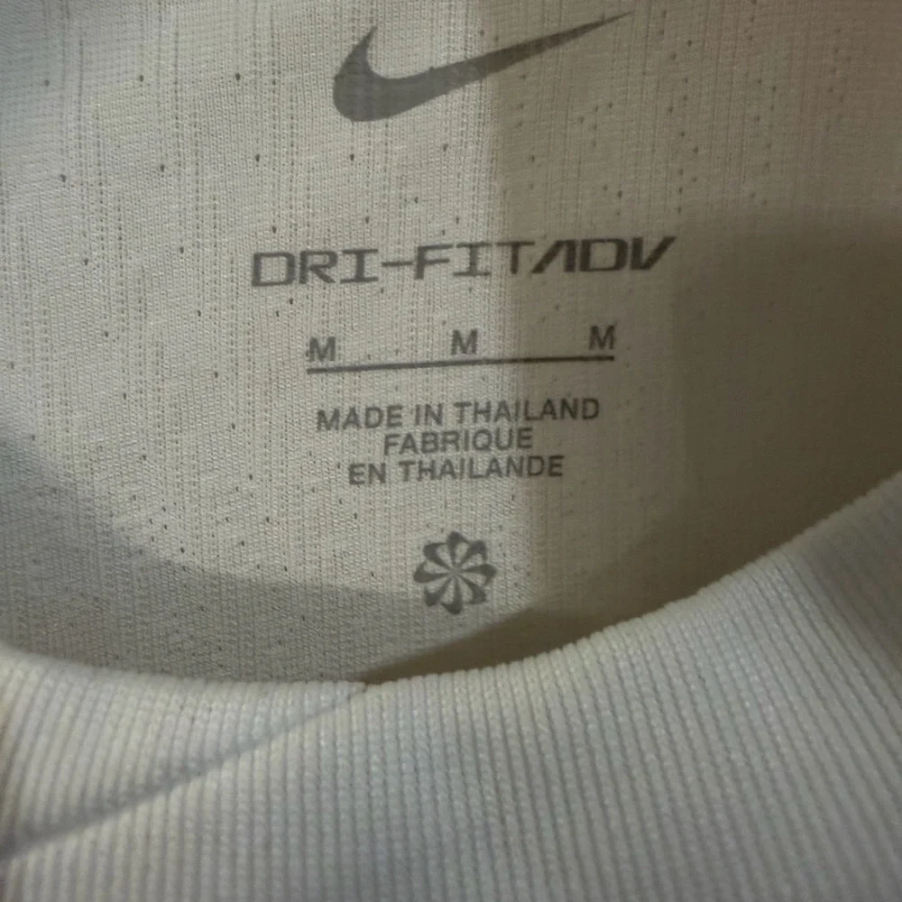 Kids Nike dri-fit ADV short sleeve white shirt